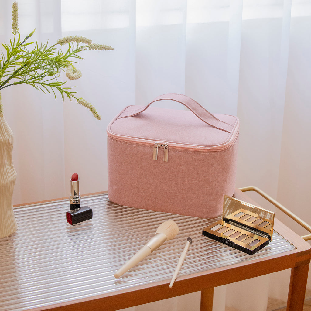 Stay organized in style with our spacious pink makeup organizer bag
